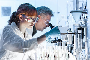 Man and woman in lab reducing gender gap