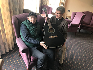 Guitarist Keith gets a special gift from pastor