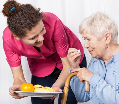 Care workers with a resident