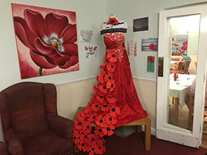 Longmore Poppy gown created by care home in tribute to veterans