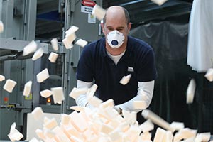 man making mattress to help supply NHS