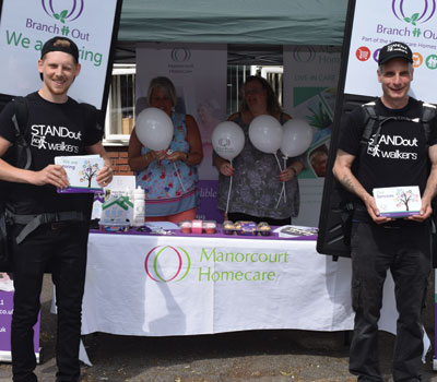 Manorcourt Homecare carers at booth on World Friendship Day