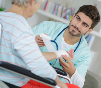 Nurse with patient using quality medical supplies