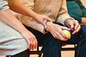 care homes - an elderly man and care home worker