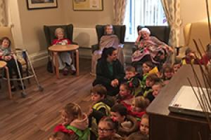 Youngsters singing for elderly on UN Children’s Day