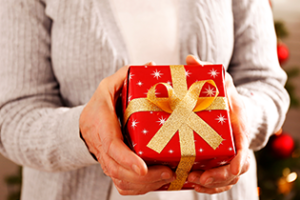 elderly lady with Christmas gift