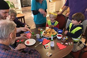 Fairmile Grange residents celebrating Children in Need with children