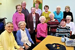 Knitted walking frame bags bring joy to care home residents