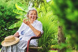 Woman Living With Dementia and Gardening