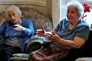 Hazelgrove Court Care Home residents Susan Turner and Pat Keleher take part in a Rainbow Tai Chi session