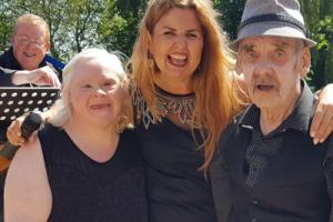 Singers at care home’s mini-festival inspired by Glastonbury