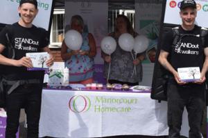 Manorcourt Homecare carers at booth on World Friendship Day