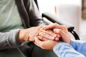 Hands of resident in social care