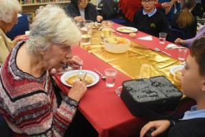 Stevenage nursing home residents at a primary school for lunch