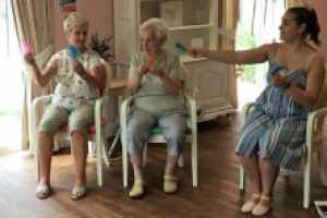 care home activities - Portsmouth care home Hartford Court welcomes dance company Golden Toes to provide seated dance classes for the residents. 